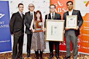 Cape Chamber Award1_300 Folio team members with their 2011 Exporter of the Year Award.