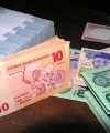 Banking sector uncertainty continues to plague Nigeria naira200x240