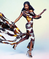 A model wearing a dress made with Dutch brand Vlisco's fabrics. A model wearing a dress made with Dutch brand Vlisco's fabrics.