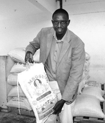 Isaac Chege with a bag of Msosi maize meal Isaac Chege with a bag of Msosi maize meal