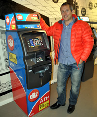 Marc Sternberg, managing director of Spark ATM Systems, with one of their new ATMs for the Zimababwean market, in partnership with CBZ Bank Limited.