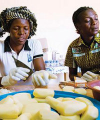 Women packing soap made from shea butter at a processing unit run by the Nununa Federation of Shea Producers in Burkina Faso. Photo: Roel Burgler/Hollandse Hoogte/Redux