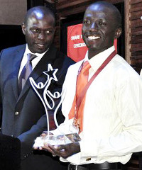 In 2012 Andrew Mupuya (right) won first place and US$30,000 in the Anzisha Prize youth entrepreneurship competition.