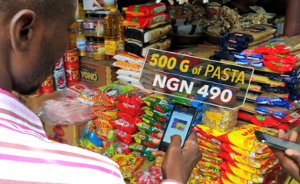 Standard Chartered has signed up more than 350 people, each equipped with a smartphone, who take pictures of product price tags.