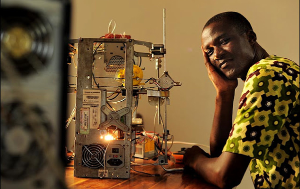 Togolese inventor Kodjo Afate Gnikou creating a 3D printer from recycled material for less than US$100 in 2013.