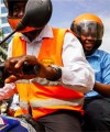 A new business model for Uganda’s motorbike taxi industry SafeBoda driver 200x240