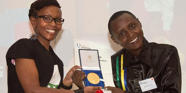 Dr Askwar Hilonga accepts the first Africa Prize for Engineering Innovation, handed over by Juliana Rotich, co-founder and executive director of Ushahidi.