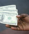Buy your dream entrepreneurial business hands-bribe-money 200x240