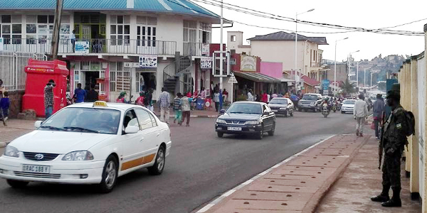 A soldier keeps watch over a street in Kigali, Rwanda.