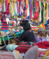 These women spot fashion trends in Brazil and bring them back to Angola Angolan female trader selling wares from Brazil and China in Luanda’s Africampo market. clothing fashion retail informal 200x240